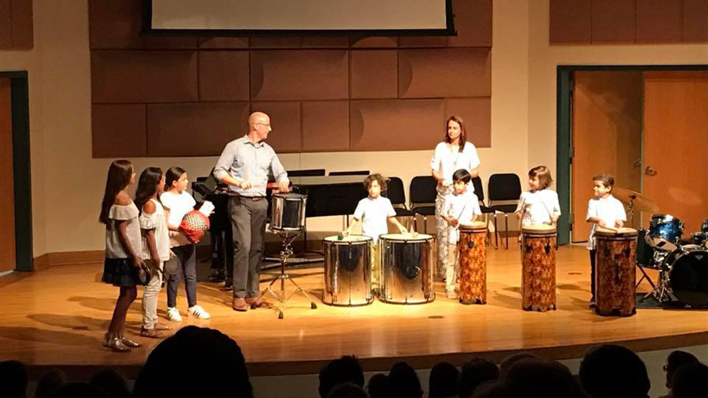 student group performs on stage