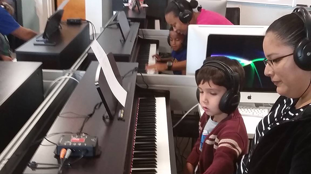 student practice in the piano lab